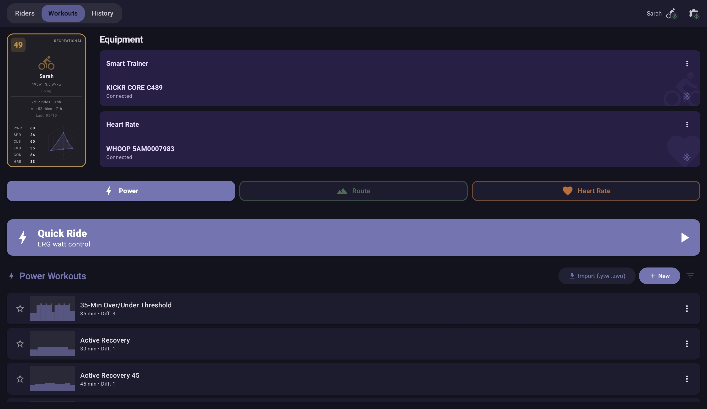 Workout-selection screen showing the three tabs — Power, Heart Rate, Route — with the bundled library beneath